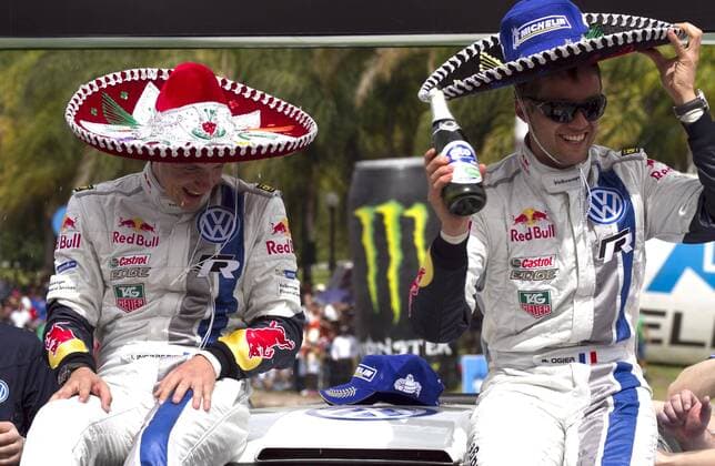 Volkswagen Motors French driver Sebastien Ogier (R) and co-driver Julien Ingrassia celebrate winning the first place of the World Rally Championship WRC Motorsport Rallye WM third stage in Leon, Guanajuato State, Mexico, on March 10, 2013. (Xinhua Jose Medrano) (mp) MEXICO-LEON-WRC 
