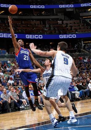 March 10, 2013 - Orlando, FL, USA - Beno Udrih and Nikola Vucevic of the Orlando Magic defend against Thaddeus Young of the Philadelphia 76ers at the Amway Center in Orlando, Florida, Sunday, March 10, 2013. The Magic won 99-91. Magic vs. Sixers - ZUMAm67