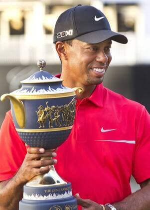 March 10, 2013 - Doral, FL, USA - Tiger Woods holds the Gene Sarazen Cup after winning the World Golf Championships Cadillac Championship at the Trump Doral Golf Club and Resort in Doral, Florida, Sunday, March 10, 2013. World Golf Championships Cadillac Championship - ZUMAm67