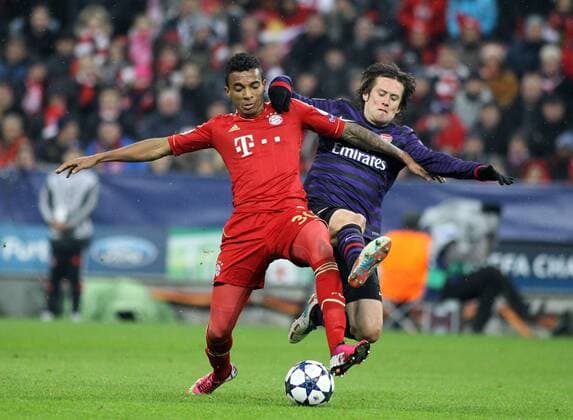 Fussball, Champions League, Achtelfinale Rückspiel, Saison 2012 2013, Herren, Deutschland, 13.03.2013, FC Bayern München - FC Arsenal London 0-2, v.l. Aktion, Zweikampf, Spielszene, action, Luiz Gustavo, FC Bayern München, Tomas Rosicky, FC Arsenal London, xklausxschillingerx