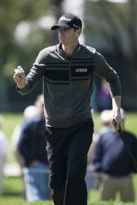 March 14, 2013 - Palm Harbor, FL, USA - Brendan Steele holds up his ball after sinking a birdie putt on the 5th hole during the first round of the Tampa Bay Championship at Innisbrook on Thursday, March 14, in Palm Harbor, Florida. Steele finished 3-under for the day. PGA Golf Herren Tampa Bay Championship - ZUMAm67