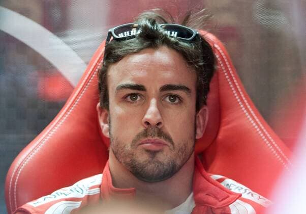 (130315) -- MELBOURNE, March 15, 2013 (Xinhua) -- Ferrari driver Fernando Alonso of Spain reacts during the first practice session of the Australian F1 Grand Prix in Melbourne, Australia, March 15, 2013. (Xinhua Bai Xue) AUSTRALIA-MELBOURNE-F1-PRACTICE SESSION 