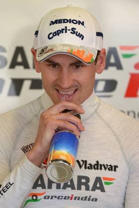 Adrian SUTIL (GER),Sahara Force India F1 Team,Aktion,Einzelbild,angeschnittenes Einzelmotiv,Halbfigur,halbe Figur,in der Box,trinkt,trinken, 1.Training,Formel 1, GP von Australien,Grand Prix Melbourne,Albert Park,Saison2013,am 15.03.2013.