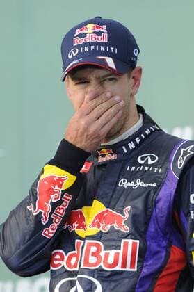 Sebastian VETTEL (GER),Red Bull Racing,Siegerehrung ,Platz 3,Enttaeuschung,Frust,enttaeuscht,frustriert,niedergeschlagen,Gestik,Aktion,Einzelbild,angeschnittenes Einzelmotiv,Halbfigur,halbe Figur Rennen,Formel 1, GP von Australien,Grand Prix Melbourne,Albert Park,Saison2013,am 17.03.2013.