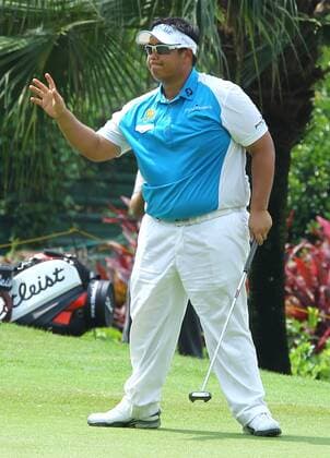 21.03.2013 Kuala Lumpur, Malaysia. Kiradech Aphibarnrat of Thailand reacts after make a birdie putts on the 12th hole during day one of the Maybank Malaysia Open Golf Tournament at the Kuala Lumpur Golf and Country Club. xMegatxFirdausx  ActionPlus11389243