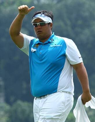 21.03.2013 Kuala Lumpur, Malaysia. Kiradech Aphibarnrat of Thailand reacts after hits the second shot on the 13th hole during day one of the Maybank Malaysia Open Golf Tournament at the Kuala Lumpur Golf and Country Club. xMegatxFirdausx  ActionPlus11389244