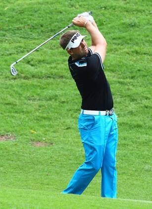 21.03.2013 Kuala Lumpur, Malaysia. Matthew Baldwin of England hits his second shot on 16th hole during day one of the Maybank Malaysia Open Golf Tournament at the Kuala Lumpur Golf and Country Club. xMegatxFirdausx  ActionPlus11389250