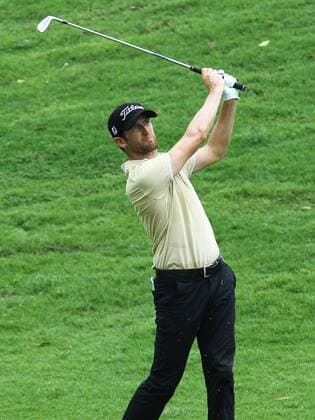 21.03.2013 Kuala Lumpur, Malaysia. Gregory Bourdy of France hits his second shot on 16th hole during day one of the Maybank Malaysia Open Golf Tournament at the Kuala Lumpur Golf and Country Club. xMegatxFirdausx  ActionPlus11389251