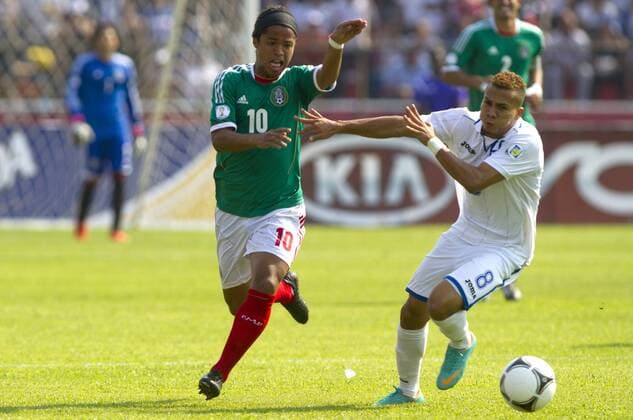 (130323) -- SAN PEDRO SULA, March 22, 2013 (Xinhua) -- Honduras Arnold Peralta (R) vies for the ball with Mexico s Giovani Dos Santos during the Brazil-2014 FIFA World Cup CONCACAF soccer qualifier match at Olimpico Metropolitano stadium in San Pedro Sula, Honduras, on March 22, 2013. The match ended with a 2-2 draw. (Xinhua StraffonImages) (mp) HONDURAS-SAN PEDRO SULA-HONDURAS VS MEXICO 