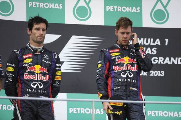 v.li:Mark WEBBER (AUS),Red Bull Racing geht auf Distanz zu Sebastian VETTEL (GER),Red Bull Racing,wenig Begeisterung bei der Siegerehrung,Aktion. Formel 1, GP von Malaysia Kuala Lumpur,Sepang Circuit,Rennen, Saison2013,am 24.03.2013.