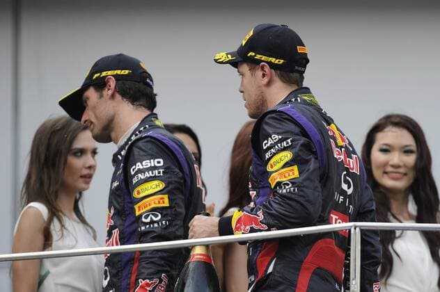 v.li:Mark WEBBER (AUS),Red Bull Racing geht auf Distanz zu Sebastian VETTEL (GER),Red Bull Racing,wenig Begeisterung,Missstimmung,Enttaeuschung,Frust,enttaeuscht,frustriert,niedergeschlagen,bei der Siegerehrung,Aktion. Formel 1, GP von Malaysia Kuala Lumpur,Sepang Circuit,Rennen, Saison2013,am 24.03.2013.