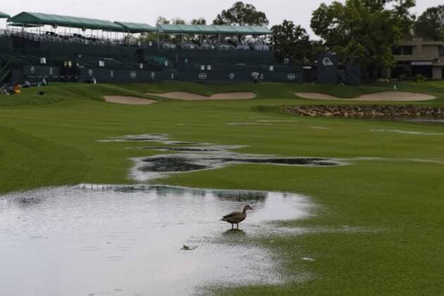 March 24, 2013 - Orlando, Florida, U.S - Ducks walk in the water on the 18th fairway during the rain delay on the final round of the Arnold Palmer Invitational at the Bay Hill Club and Lodge. Golf 2013 - Arnold Palmer Invitational - Final Round  - ZUMAr11
