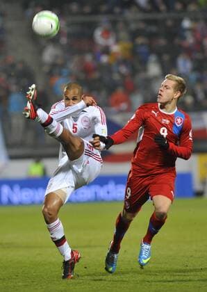 Danish player Simon Busk Poulsen (left) and Czech Republic s player Matej Vydra fight for the ball in their 2014 World Cup qualifying soccer match Czech Republic against Denmark in Olomouc, Czech Republic, Friday, March 22, 2013. (CTKxPhoto LudekxPerina) CTKPhotoP201303221080401  LPE 021