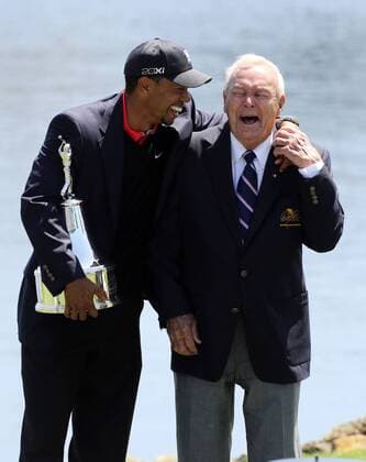 March 24, 2013 - Orlando, FL, USA - Tiger Woods and Arnold Palmer, right, share a laugh and hug after Woods won his eighth Arnold Palmer Invitational in Orlando, Florida, Monday, March 25, 2013. Arnold Palmer Invitational - ZUMAm67