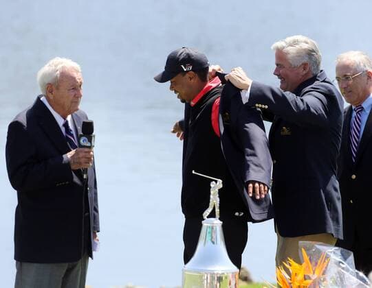 March 24, 2013 - Orlando, FL, USA - Tiger Woods is presented with a jacket after winning his eighth Arnold Palmer Invitational in Orlando, Florida, Monday, March 25, 2013. Arnold Palmer Invitational - ZUMAm67