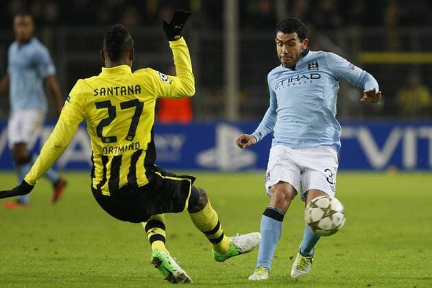 04.12.2012,JF, UEFA Champions League Borussia Dortmund vs Manchester City, v.l. Dortmund s Defender Felipe Santana(27), Manchester City s Forward Carlos Tevez(32), FOTO: Huebner Ferreira
