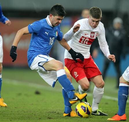 GLIWICE 27.03.2013 FOOTBALL 12TH FOUR NATIONS TOURNAMENT POLAND U20 - ITALY U20 - MASSIMILIANO BUSELLATO ITA, MICHAL CHRAPEK POL -  130327MIN011