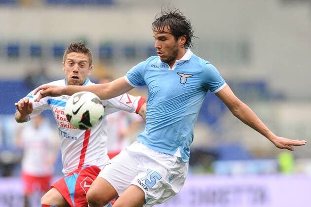 Alvaro Gonzalez Lazio, Alejandro Gomez Catania.30 03 2013 Roma.Stadio Olimpico.Football Calcio 2012 2013 .Campionato di calcio serie A. Lazio Rom - Catania Calcio. AntoniettaxBaldassarre