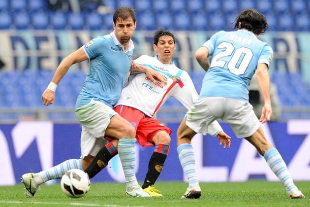 Lorik Cana Lazio, Pablo Barrientos Catania.30 03 2013 Roma.Stadio Olimpico.Football Calcio 2012 2013 .Campionato di calcio serie A. Lazio Rom - Catania Calcio. AntoniettaxBaldassarre