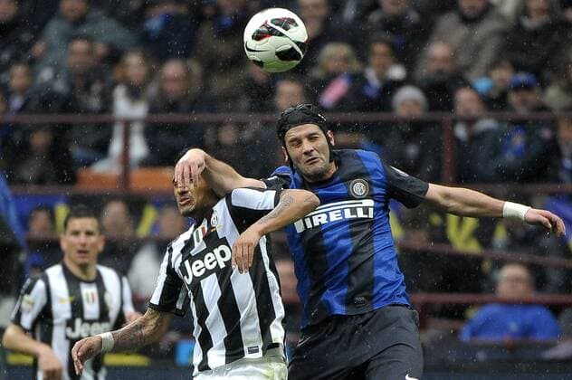 Arturo Vidal Juventus Christian Chivu Inter.Milano 30 03 2013 Stadio Giuseppe Meazza - San Siro Milano.Football Calcio Serie A 2012 13.Inter Mailand - Juventus Turin. federicoxtardito