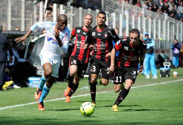 Rod Fanni (OM) - Thimothee Kolodziejczak - Didier Digard ( NICE ) FOOTBALL : OGC Nice vs Olympique de Marseille . - Ligue 1 - 31 03 2013 OlivierAnrigo Panoramic 