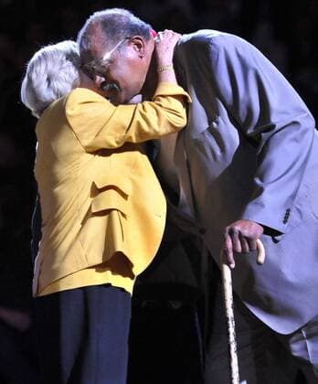April 6, 2013 - Washington, DC, USA - Irena Pollin, widow of Washington Bullets owner Abe Pollin, hugs Wes Unseld, who was the center of the Washington Bullets that won an NBA Basketball Herren USA Championship in 1978, during a half-time ceremony at the Verizon Center in Washington, D.C., Saturday, April 6, 2013. The Washington Wizards defeated the Indiana Pacers, 104-85. Indiana at Washington - ZUMAm67