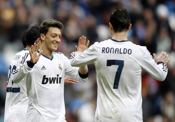 Real Madrid s Cristiano Ronaldo, Mesut Özil celebrate goal during La Liga BBVA match Real Madrid vs UD Levante .  (201304060130)