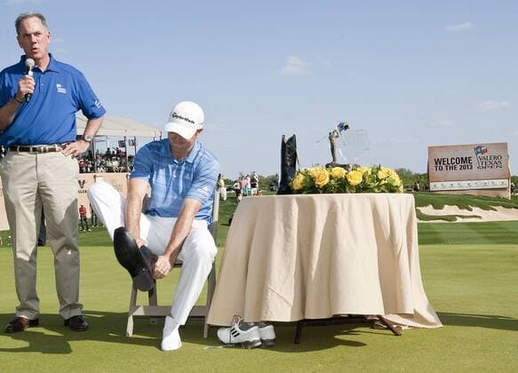 April 7, 2013 - San Antonio, Texas, United States of America - April 07, 2013: Martin Laird putting on the winners cowboy boots at the Valero Texas Open held at the AT&T Oaks Course at TPC San Antonio, Texas. PGA Golf Herren 2013: Valero Texas Open APR 07 - ZUMAc04