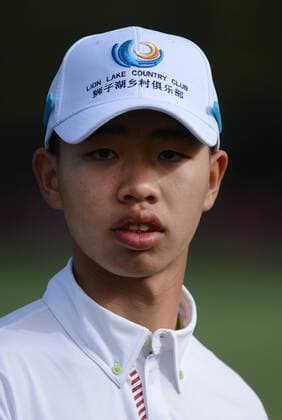 Guan Tianlang of China is seen on the practice range during a practice round before the Master golf tournament at Augusta National Golf Club on April 8, 2013 in Augusta, Georgia. Tianlang, the Asia-Pacific Amateur Champion, will be the youngest starter in Masters history at 14-years-old.  AUG20130408303
