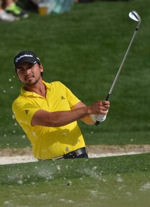 Jason Day hits out of a bunker on the 16th green during a practice round before the Master golf tournament at Augusta National Golf Club on April 8, 2013 in Augusta, Georgia.  AUG20130408345