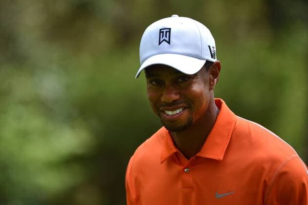 Tiger Woods walks to the 11th tee during a practice round before the Master golf tournament at Augusta National Golf Club on April 8, 2013 in Augusta, Georgia.  AUG20130408356