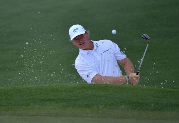 Ernie Ells hits out of a bunker on the 2nd hold during a practice round before the Master golf tournament at Augusta National Golf Club on April 8, 2013 in Augusta, Georgia.  AUG20130408357