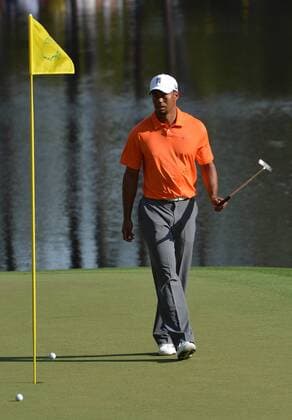 Tiger Woods lines up a putt on the 16th green during a practice round before the Master golf tournament at Augusta National Golf Club on April 8, 2013 in Augusta, Georgia.  AUG20130408329