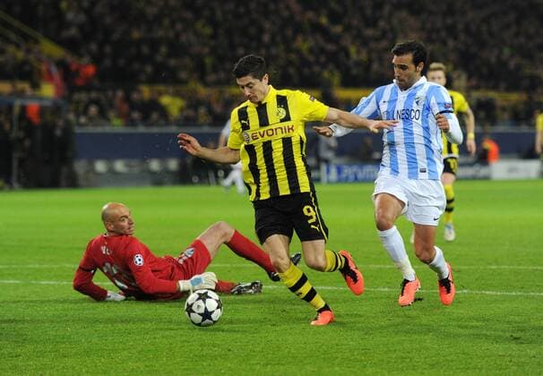 09-04-2013, Fussball, Saison 2012-2013, UEFA Champions League, Viertelfinale, Rückspiel, Borussia Dortmund - FC Malaga, Robert Lewandowski (Borussia Dortmund), mi., umspielt Torhüter Willy Caballero (FC Malaga) und erzielt das Tor zum 1-1