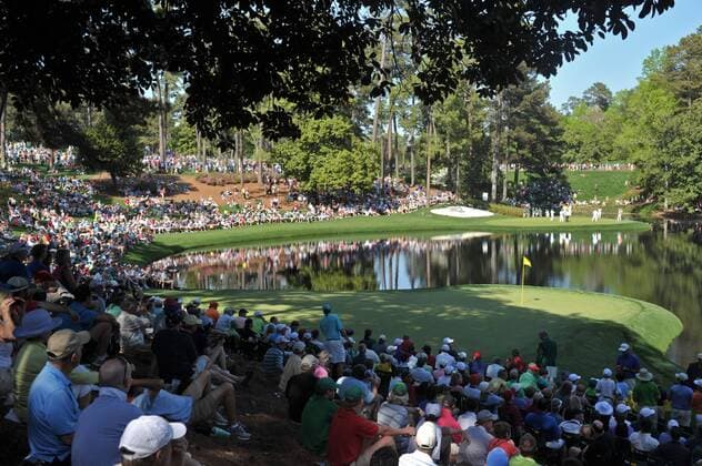Patrons gather for the Masters Par 3 Contest, a day before the beginning of the Masters tournament, at Augusta National, on April 10, 2013 in Augusta, Georgia.  AUG20130410331