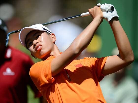 April 10, 2013 - Augusta, GA, USA - Tianlang Guan watches a tee shot during the Par 3 Contest at the Masters at Augusta National Golf Club on Wednesday, April 10, 2013, in Augusta, Georgia. Masters at Augusta National Golf Club - ZUMAm67
