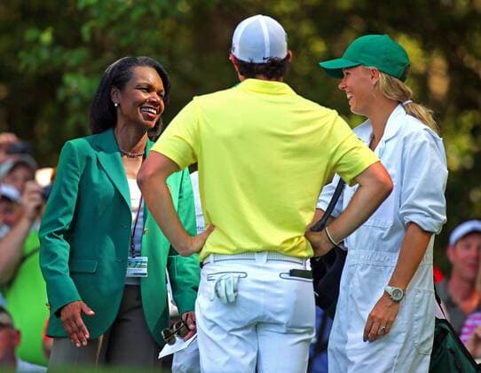 April 10, 2013 - Augusta, Georgia, U.S. - New Augusta National member CONDOLEEZZA RICE shares a laugh with RORY MCILROY and his girlfriend, CAROLINE WOZNIACKI, on the sixth tee box during the Par-3 Contest at the Masters at Augusta National Golf Club. Golf 2013 - Masters Tournament - Par 3 Contest - ZUMAm67