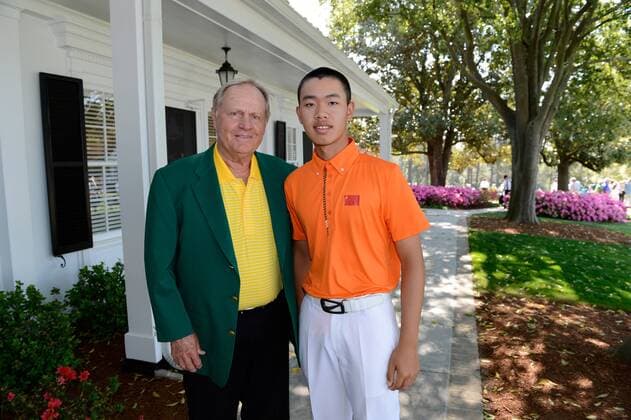 (130411) -- AUGUSTA, April 10, 2013 (Xinhua) -- Masters champion Jack Nicklaus (L) poses for photos with Guan Tianlang of China during Practice Round 3 for the 2013 Masters, at the Augusta National Golf Club in Augusta, Georgia, the United States, on April 10, 2013. (Xinhua Rusty Jarrett Augusta National) (zf) U.S.-AUGUSTA-2013 MASTERS-CHINA-GUAN TIANLANG 