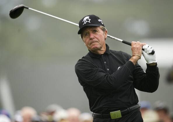 Honorary starter Gary Player watches his drive off of the first tee as he starts the 2013 Masters at Augusta National on April 11, 2013 in Augusta, Georgia. .  AUG20130411315