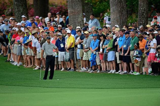 (130412) -- AUGUSTA, April 11, 2013 (Xinhua) -- Tiger Woods (Front) of the United States reacts during the first round of the 2013 Masters golf tournament at the Augusta National Golf Club in Augusta, Georgia, the United States, April 11, 2013. Woods shot a two-under par 70 on Thursday. (Xinhua Scott K. Brown Augusta National) U.S.-AUGUSTA-GOLF-2013 MASTERS 