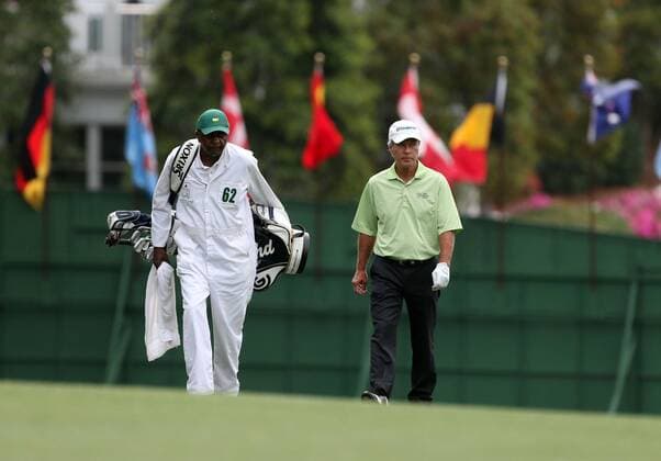 April 12, 2013 - Augusta, GA, USA - Ben Crenshaw, right, and his caddie, Carl Jackson, walk up the No. 1 fairway during the second round of the Masters Tournament at Augusta National Golf Club, Friday, April 12, 2013, in Augusta, Georgia. Masters Tournament at Augusta National - ZUMAm67