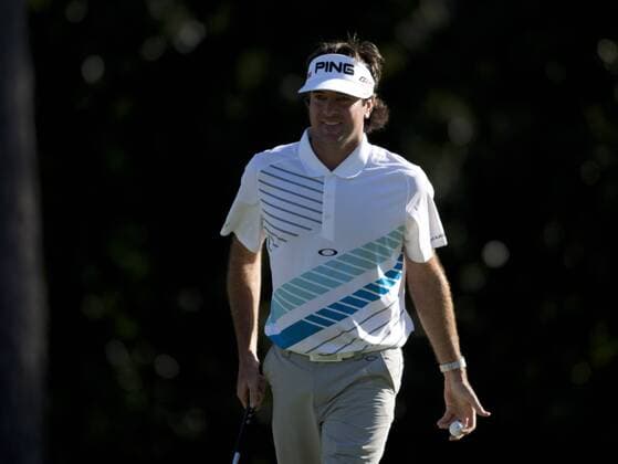 Bubba Watson walks off of the 14th green during the second round of the Masters at Augusta National on April 12, 2013 in Augusta, Georgia.  AUG20130412374