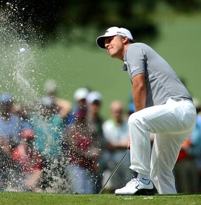 April 12, 2013 - Augusta, GA, USA - Freddie Jacobson watches the flight of his ball from a sand trap along the 7th green during second-round action of the Masters at Augusta National Golf Club, Friday, April 12, 2013, in Augusta, Georgia. Masters Tournament at Augusta National - ZUMAm67