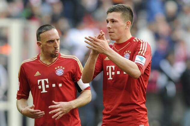 v.li::Franck RIBERY (Bayern München) mit Kapitaensbinde,Mannschaftskapitaen,Pierre Emil Höjbjerg (Bayern München),nach dem Schlusspfiff,Aktion. Fussball 1. Bundesliga, 29 Spieltag,Fussball 1. Bundesliga FC Bayern München (M)-1.FC Nürnberg (N) 4-0. Liga1,Spieltag29,Saison 2012 13,am 13.04.2013. A L L I A N Z A R E N A.