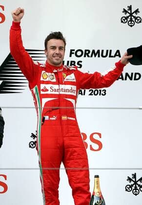 (130414) -- SHANGHAI, April 14, 2013 (Xinhua) -- Ferrari driver Fernando Alonso celebrates on the podium after winning the Formula One Chinese Grand Prix at the Shanghai International circuit, in Shanghai, east China, on April 14, 2013. (Xinhua Fan Jun) CHINA-SHANGHAI-F1 (CN) 