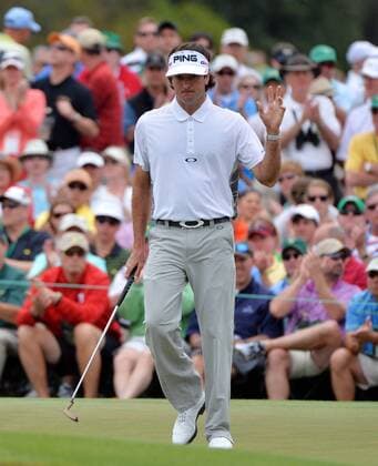 Bubba Watson reacts after a putt on the front nine in the fourth round of the Masters at Augusta National on April 14, 2013 in Augusta, Georgia.  AUG20130414511
