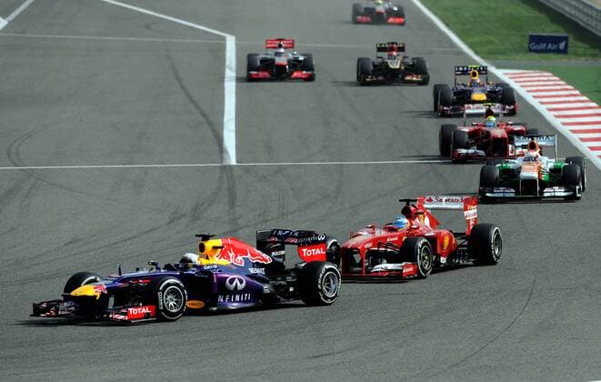 (130421) -- MANAMA, April 21, 2013 (Xinhua) -- Red Bull driver Sebastian Vettel (1st L) drives during the Bahrain F1 Grand Prix at the Bahrain International Circuit in Manama, Bahrain, on April 21, 2013. (Xinhua Chen Shaojin) (zf) BAHRAIN-MANAMA-F1 