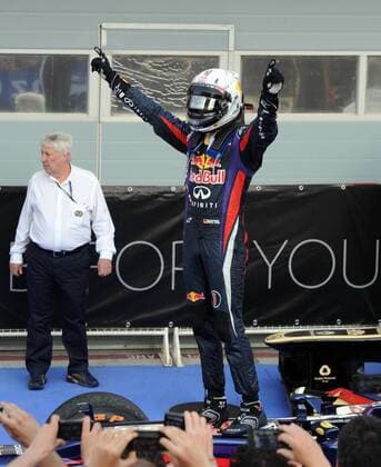 (130421) -- MANAMA, April 21, 2013 (Xinhua) -- Red Bull driver Sebastian Vettel celebrates during the victory ceremony of the Bahrain F1 Grand Prix at the Bahrain International Circuit in Manama, Bahrain, on April 21, 2013. (Xinhua Chen Shaojin) (zf) BAHRAIN-MANAMA-F1 