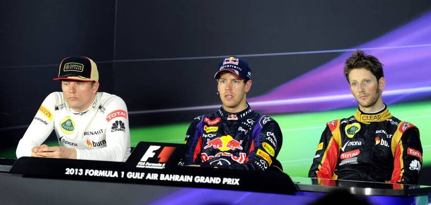 (130421) -- MANAMA, April 21, 2013 (Xinhua) -- Red Bull driver Sebastian Vettel (C), Lotus driver Kimi Raikkonen (L) and Lotus driver Romain Grosjean attend a press conference after the Bahrain F1 Grand Prix at the Bahrain International Circuit in Manama, Bahrain, on April 21, 2013. (Xinhua Chen Shaojin) (zf) BAHRAIN-MANAMA-F1 
