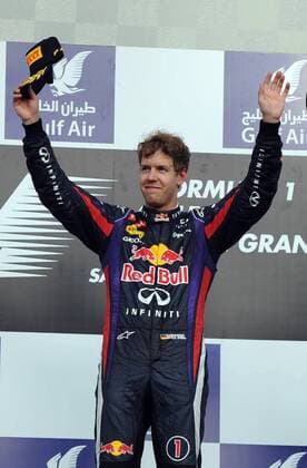 (130421) -- MANAMA, April 21, 2013 (Xinhua) -- Red Bull driver Sebastian Vettel celebrates during the victory ceremony of the Bahrain F1 Grand Prix at the Bahrain International Circuit in Manama, Bahrain, on April 21, 2013. (Xinhua Chen Shaojin) (zf) BAHRAIN-MANAMA-F1 